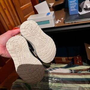 Hey Dude Black Sneakers with Textured Tread Pattern